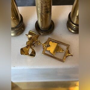 Gold Toned Bow With Maple Leaf Brooch